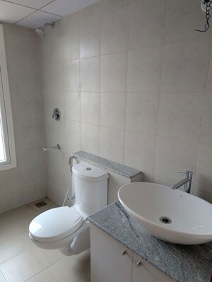 Bathroom in 1 BHK Apartment at Bhartiya City Nikoo Homes 4, Thanisandra Main Road – for Sale