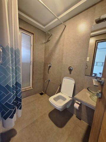 Bathroom in 2 BHK Apartment at Next Avenue Apartment, Khar West – for Rent