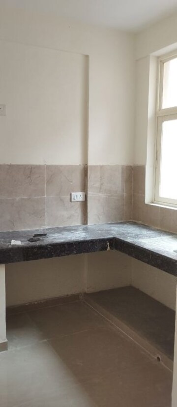 Kitchen in 2 BHK Apartment at Shri Balaji BCC Heights, Raebareli Road – for Sale