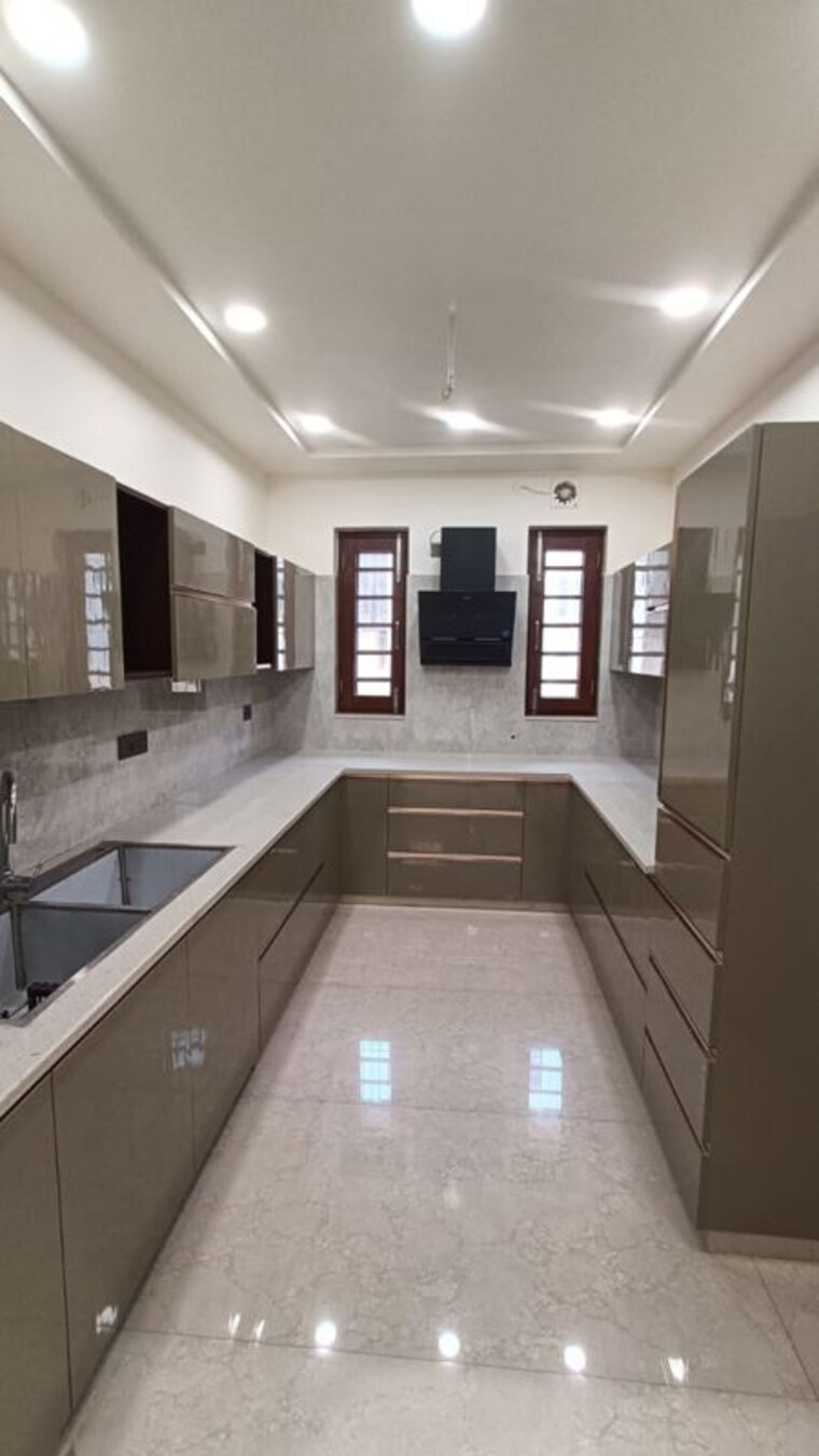Kitchen, puri-aman-vilas 4 Bedroom 342 Sq.Yd. Builder Floor In Sector 89 Faridabad 10089434