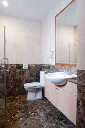 Bathroom in 3 BHK Apartment at Evershine Cosmic, Andheri West – for Rent