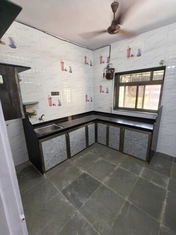 Kitchen in 1 BHK Apartment at Mahadev Darshan, Andheri East – for Rent