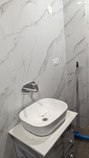 Bathroom in 4 BHK Builder Floor at Puri Aman Vilas, Sector 89 – for Sale