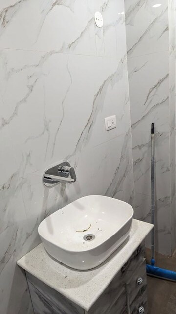 Bathroom in 4 BHK Builder Floor at Puri Aman Vilas, Sector 89 – for Sale