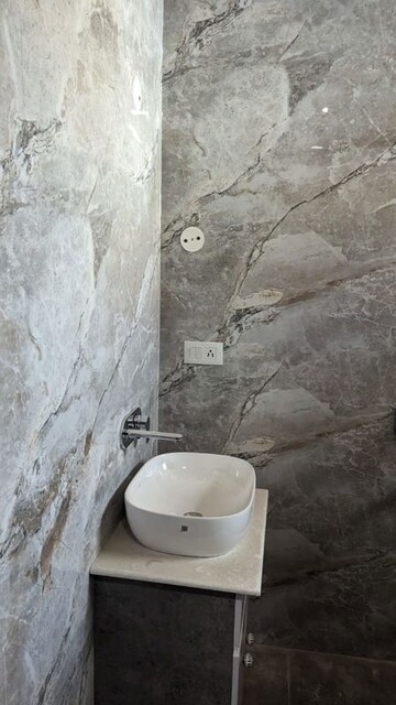 Bathroom in 4 BHK Builder Floor at Puri Aman Vilas, Sector 89 – for Sale