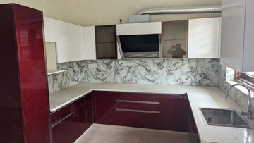 Kitchen in 4 BHK Builder Floor at Puri Aman Vilas, Sector 89 – for Sale