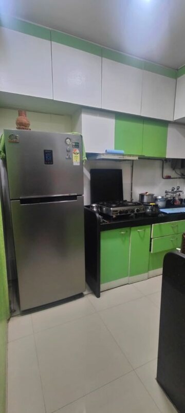 Kitchen in 3 BHK Apartment at Sandstone CHS Ltd, Mira Road – for Rent