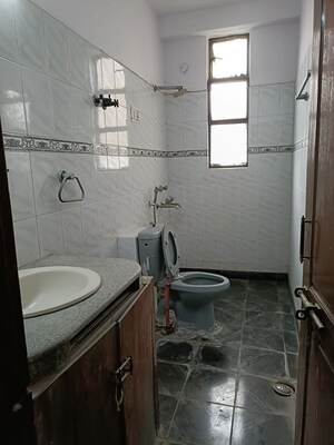 Bathroom in 3 BHK Apartment at Vasundhara Enclave – for Sale
