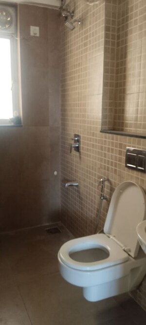 Bathroom in 2 BHK Apartment at Mulund West – for Rent