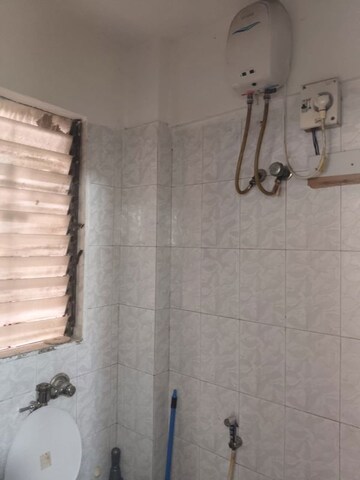 Bathroom in 2 BHK Apartment at Royal Classic Co Op Society, Andheri West – for Rent