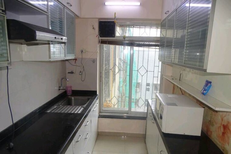 Kitchen, mantri-serene 2 Bedroom 950 Sq.Ft. Apartment In Goregaon East Mumbai 10089979