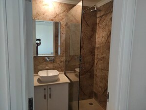 Bathroom in 4 BHK Builder Floor at Puri Aman Vilas, Sector 89 – for Sale