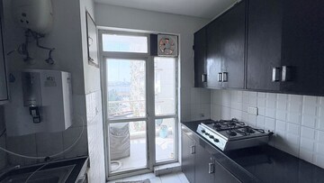 Kitchen in 4 BHK Builder Floor at BPTP Park Prime, Sector 66 – for Rent