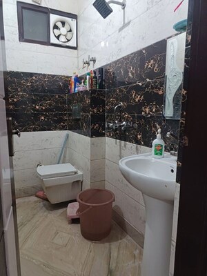 Bathroom in 2 BHK Builder Floor at Dwarka Mor – for Sale
