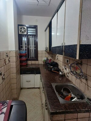 Kitchen in 2 BHK Builder Floor at Dwarka Mor – for Sale