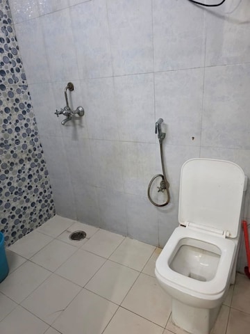 Bathroom in 4 BHK Builder Floor at Freedom Fighters Enclave – for Rent