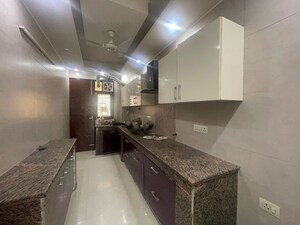 Kitchen in 3 BHK Builder Floor at Ansal Sushant Lok I, Sector 43 – for Sale