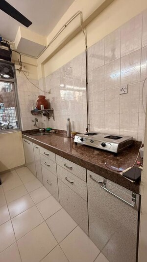 Kitchen in 2.5 BHK Apartment at Wadhwa TW Gardens, Kandivali East – for Sale