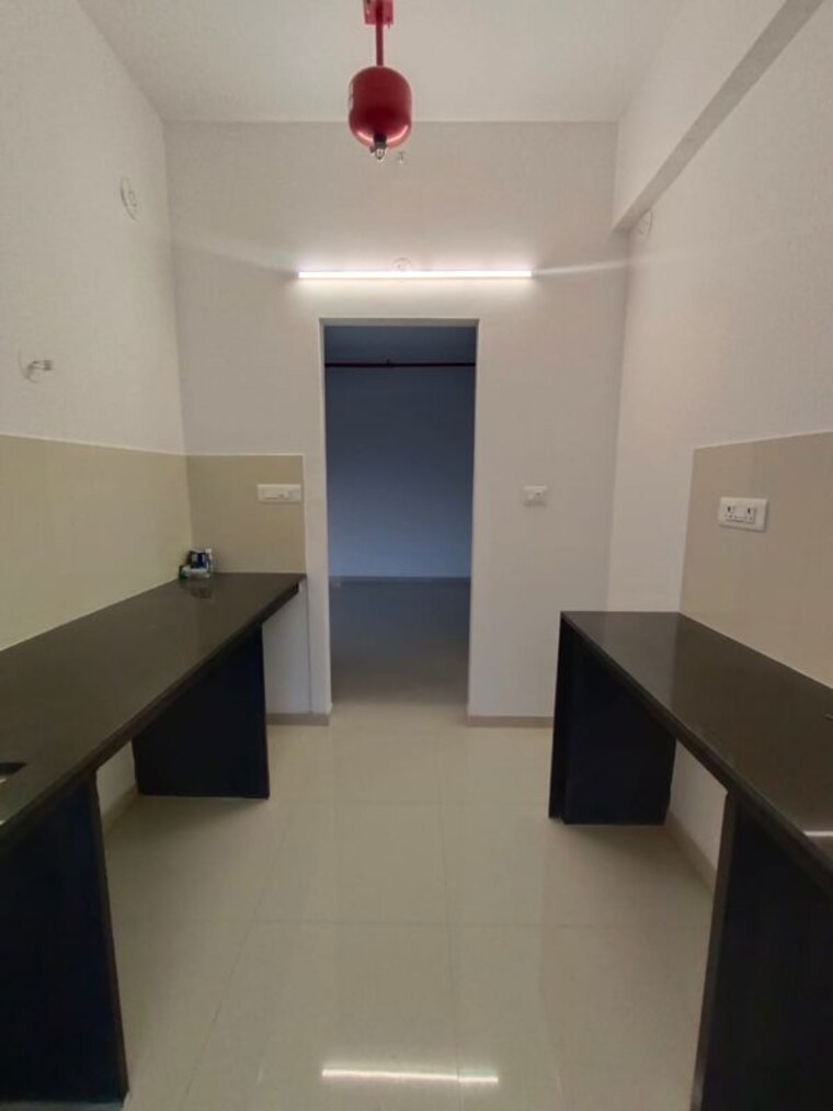 Kitchen, runwal-the-central-park 2 Bedroom 666 Sq.Ft. Apartment In Chinchwad Pune 10089552