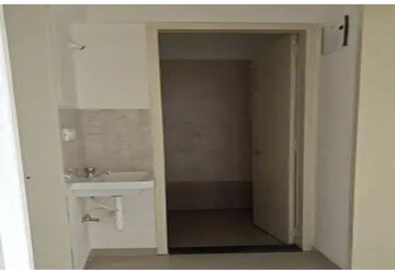 Bathroom in 1 BHK Apartment at Kohinoor Group Abhimaan, Shirgaon – for Rent
