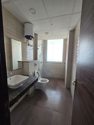Bathroom in 4 BHK Apartment at Krrish Provence Estate, Gurgaon Faridabad Road – for Rent