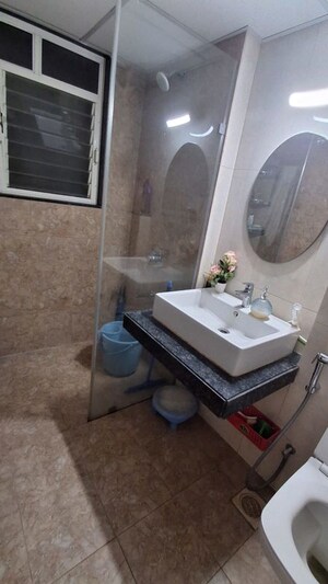 Bathroom in 3 BHK Apartment at Kolte Patil Tuscan Estate, Kharadi – for Rent