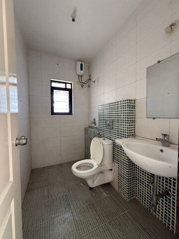 Bathroom in 3 BHK Apartment at Golden Cascade, Wakad – for Rent