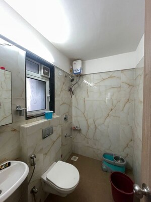 Bathroom in 1.5 BHK Apartment at MICL Aaradhya One Earth, Ghatkopar East – for Rent