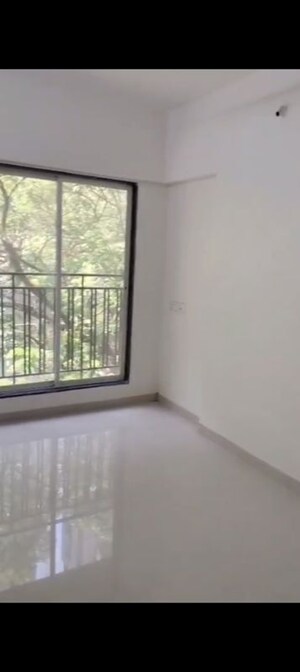 Room in 2 BHK Apartment at Bini Winspace Amelio, Andheri West – for Sale