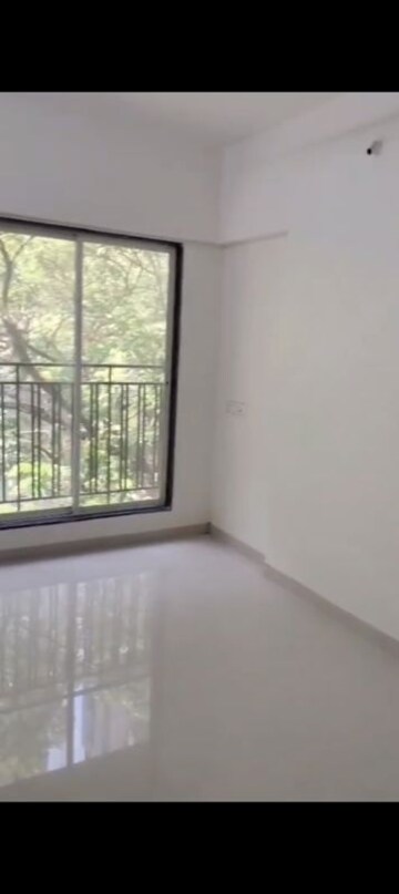 Room in 2 BHK Apartment at Bini Winspace Amelio, Andheri West – for Sale