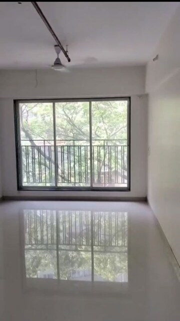 Room in 2 BHK Apartment at Bini Winspace Amelio, Andheri West – for Sale