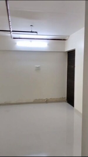 Room in 2 BHK Apartment at Bini Winspace Amelio, Andheri West – for Sale