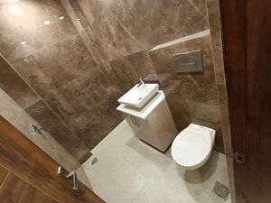 Bathroom in 4 BHK Builder Floor at Puri Aman Vilas, Sector 89 – for Sale