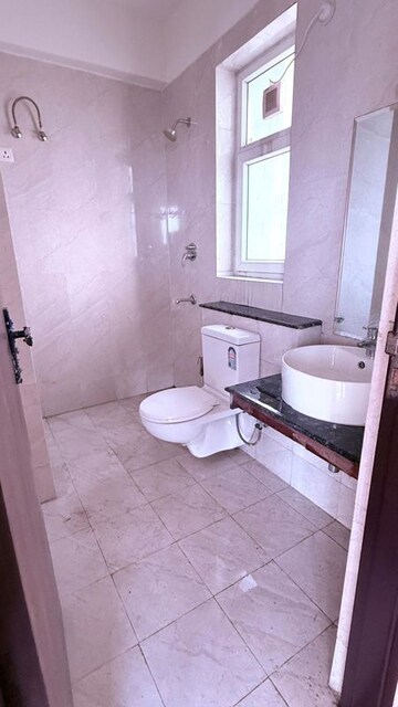 Bathroom in 3 BHK Apartment at Adani M2K Oyster Grande, Sector 102 – for Sale