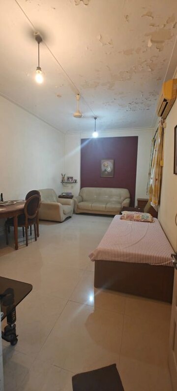 Living Room in 1 BHK Apartment at Poornima Apartments, Colaba – for Sale