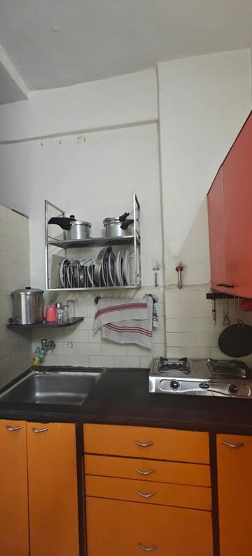 Kitchen in 1 BHK Apartment at Poornima Apartments, Colaba – for Sale