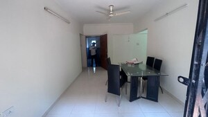 Living Room in 1 BHK Apartment at Malkani Bella Vista, Viman Nagar – for Rent