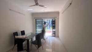 Living Room in 1 BHK Apartment at Malkani Bella Vista, Viman Nagar – for Rent
