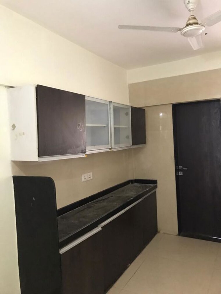Kitchen, gini-viviana 2 Bedroom 1000 Sq.Ft. Apartment In Balewadi Pune 10093077