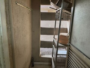 Staircase in 2 BHK Apartment at Raheja Interface Heights, Malad West – for Rent