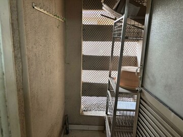 Staircase in 2 BHK Apartment at Raheja Interface Heights, Malad West – for Rent