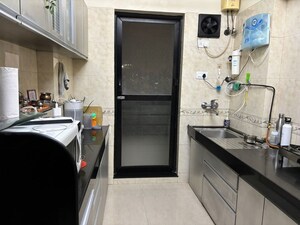 Kitchen in 2 BHK Apartment at Raheja Interface Heights, Malad West – for Rent