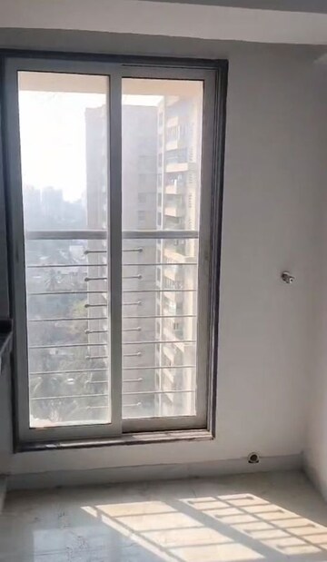 Room in 2 BHK Apartment at Jyoti Royal CHS, Andheri West – for Sale