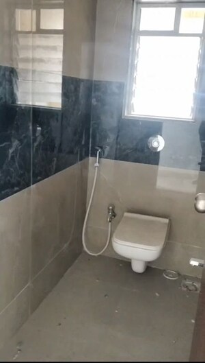 Bathroom in 2 BHK Apartment at Jyoti Royal CHS, Andheri West – for Sale