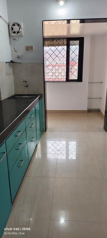 Kitchen in 2 BHK Apartment at Madhuban Shiv Dham Complex, Malad East – for Rent