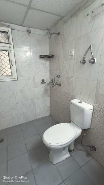 Bathroom in 2.5 BHK Apartment at Aims Golf City, Sector 75 – for Rent