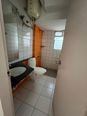 Bathroom in 4 BHK Apartment at G R Shanthinivas, Singasandra – for Sale