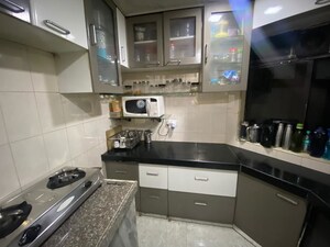 Kitchen in 3 BHK Apartment at Kopar Khairane – for Rent
