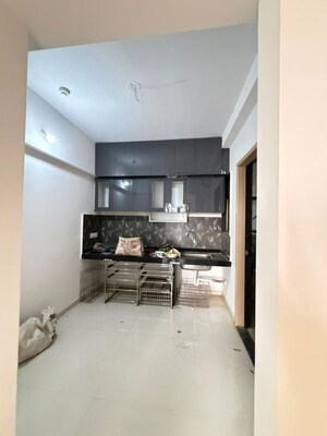 Kitchen in 2 BHK Apartment at Kohinoor Courtyard One, Wakad – for Rent