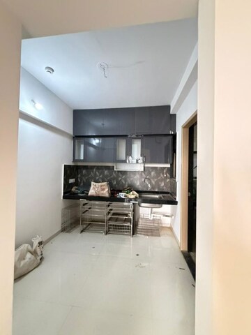 Kitchen in 2 BHK Apartment at Kohinoor Courtyard One, Wakad – for Rent